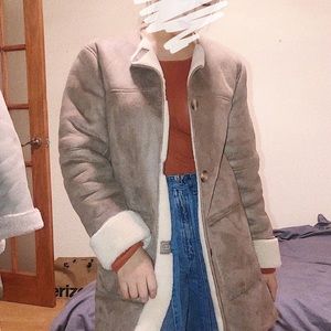 Brand new never worn Zara coat with fur inside.